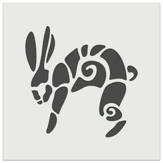 an animal that is in the shape of a rabbit with swirls on it's tail