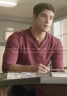 a man sitting at a desk in an office