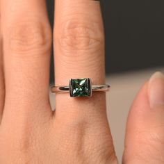 This is a gorgeous handmade creation. Its beauty is its simplicity & Elegance. The 6*6mm princess cut green sapphire is crafted in solid sterling silver / 14k gold. It is available to customized, if you have any mind, just let me know, we will discuss with it. All item is sent in a beautiful gift box You can realize more lovely stuff clicking the link https://www.etsy.com/shop/knightjewelry?refshopsection_shophome_leftnav Please leave the correct address and you PHONE NUMBER for delivering s Promise Princess Cut Birthstone Ring, Princess Cut Emerald Promise Ring, Formal Princess Cut Emerald Ring, Fine Jewelry Princess Cut Solitaire Birthstone Ring, Sterling Silver Emerald Solitaire Ring Princess Cut, Sterling Silver Emerald Ring Princess Cut, Sterling Silver Princess Cut Emerald Ring, Classic Jewelry With May Birthstone In Princess Cut, Princess Cut Solitaire Emerald Ring In Sterling Silver