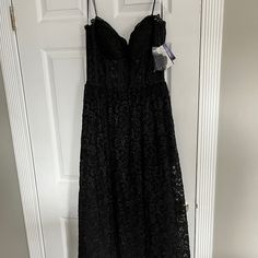 Morgan & Co Black Tie Corseted Black Tie Gown. Style #13142. Dress Is Strapless (Has Straps If You Would Like To Attach), Has Cup Support, Back Zip. Lace Overlay Of Tulle Skirt. Waist Is Unlined So You Can See Skin. Measurements: Length 51 Inches, Waist 32. Junior Size 9 Black Strapless Gown With Corset Back, Black Corset Dress With Lace Trim And Sweetheart Neckline, Iridescent Prom Dress, Black Strapless Corset With Lace Trim, Y2k Prom Dress, Navy Sequin Dress, Mesh Insert Dress, Sparkle Prom Dress, Dresses Corset