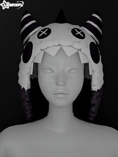 a white mannequin head with black and white ears