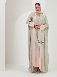 Silver Piping Luxury Light fabric is perfect for a hot summer. Three-piece Scarf İnner dress Abaya Kaftan Set Two side colour scarf you can choose the colour you like Model height: 175 CM 90% Cotton 10% Linen Length: 140cm Summer Long Sleeve Pink Abaya, Festive Long Pink Abaya, Long Abaya For Beach Eid Celebration, Beach-style Long Abaya For Eid, Kaftan Set, Dress Abaya, Abaya Dress, Luxury Lighting, Three Piece