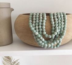 Another lovely shot from @richhippiedesign on #IG. #TheBeadChest #EthicallySourced #Jewelry #Chic #AfricanBeads #StoneBeads #DecorativeBeads #Turquoise #DIY #Boho #JewelryBlogger #BeadMaker #HealingStones #CrystalJewelry #HomeDecor #InteriorDesign #DIYDecor #UpcycledJewelry #FallJewelry #Handmade #HandmadeJewelry #Turquoise #PrayerBeads #WomensFashion #FallStyle #FallJewelryStyle #Weaving #DIYCrafts #Necklace #FallEarrings #AutumnJewelry #FallChic Rustic Large Beads For Gifts, Artisan Beaded Bracelets With Gemstone Beads, Rustic Wooden Beads, Rustic Round Wooden Beads, Handmade Nature-inspired Beaded Bracelets, Earthy Turquoise Beaded Necklaces With Round Beads, Handmade Nature-inspired Beaded Bracelets With Round Beads, Earthy Spacer Beads For Jewelry Making, Nature-inspired Beaded Necklace With Wooden Beads