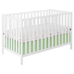 a small white crib with green trim on the bottom and side rails, in front of a white background