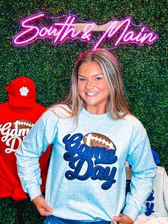 Be ready for game day with this sweatshirt! Featuring black glitter chenille, navy game day, and a football, it’s perfect for football season and will match any school colors! So cute and comfortable. You need one of these for game days. Make football season even more fun with this sweatshirt! Unisex sizing and fit Size: Adult Small - Adult 3XL There are many different shirt colors. If the variant you want is not in the dropdown but in the picture, specify it in the "notes" section at checkout. Game Day Fan Apparel Sweatshirt For Fall, School Spirit Sweatshirt For Game Day, School Spirit Sweatshirt For Baseball Season, School Spirit Sweatshirt For Game Day With Team Name, Game Day Football Season Sports Fan Sweatshirt, Collegiate Mascot Sweatshirt For Game Day, Blue Sweatshirt For Game Day With School Spirit, Blue Varsity Sweatshirt For Game Day, Chenille Sweatshirt