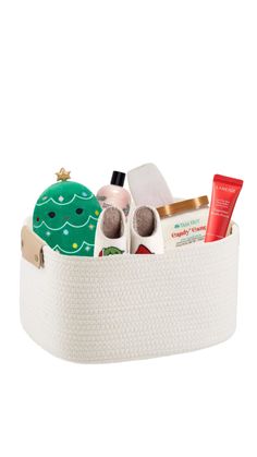 a white basket filled with lots of different items