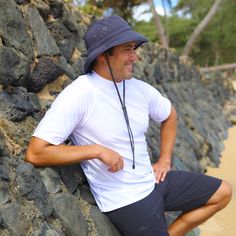 Our men's voyager hat is one of our bestselling sun hats for men. This men's bucket hat with a drawstring provides the perfect grab-and-go sun protection that will keep you covered no matter where your next adventure takes you. Wear it sailing, paddle boarding, kayaking, or relaxing on the beach for sun protection you can trust that's recommended by the Skin Cancer Foundation. Functional Outdoor Hats With Upf 50+, Upf 50+ Khaki Hat For Camping, Outdoor Hats With Upf 50+ Protection, Upf 50+ Visor Bucket Hat For Camping, Sun Hats For Men, Adjustable Upf 50+ Sun Hat For Fishing, Bucket Hat For Men, Mens Bucket Hats, Mens Sun Hats