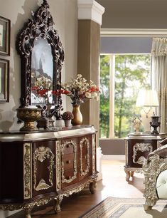 an ornately decorated living room with large windows