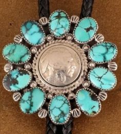 This fantastic Navajo Bolo features natural turquoise oval cabs surrounding the "Indian Head" side of a US "Buffalo" nickle (1913-1938.) Three Native American Chiefs served as models for the composite image, carved by James Earle Fraser: Iron Tail (Lakota), Two Moons(Cheyenne), and Big Tree (Kiowa). Turquoise Coral Jewelry, Turquoise Accessories, Navajo Turquoise Jewelry, Boho Jewels, Buffalo Nickel, Jewelry Turquoise