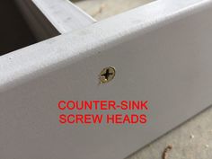 the word counter - sink screw heads is written in red and black on a white surface