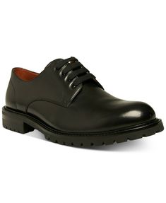 Steve Madden Men's Karbon Lug Sole Oxfords The sharp appeal of an Oxford up top, the ruggedness of boot down below, Steve Madden's Karbon shoes bring together a polished classic look with a durable sole for all-weather versatility and style. Plain-toe lace-up Oxfords Round eyelets Lug sole for traction Leather upper; Leather lining; Rubber sole Imported Business Dress Shoes With Lug Sole, Business Dress Shoes With Lug Sole, Plain Toe, Business Dress Shoes With Lug Sole And Round Toe, Black Leather Shoes With Lug Sole For Business, Black Oxfords With Vibram Sole For Business, Masculine Office Shoes With Round Toe, Masculine Lace-up Shoes For Work, Masculine Lace-up Shoes For Workwear, Steve Maddens