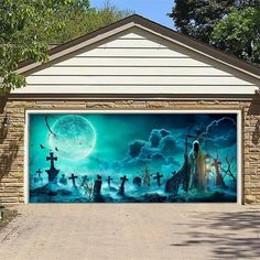 a garage with a painting on the side of it