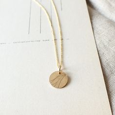 Our River necklace was designed with remarkable women in mind. Wear it to celebrate your own indomitable spirit or gift it to someone special. Everyday Spiritual Round Charm Necklaces, Elegant Round Medallion Necklace Gift, Elegant Round Disc Medallion Necklace As Gift, Elegant Round Pendant Medallion Necklace As Gift, Elegant Round Pendant Medallion Necklace For Gift, Minimalist Medallion Jewelry For Everyday, Medallion Coin Necklace As Gift, Round Sterling Silver Medallion Necklace, Adjustable Round Medallion Necklace As Gift