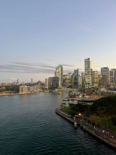 an aerial view of a city and the water