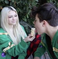 a man and woman eating ice cream together