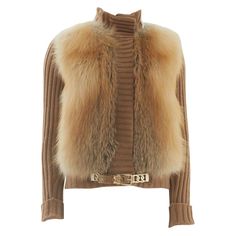 - Early 2000s - Sold by Skof.Archive - Camel fox fur knitted cardigan - Funnel neck with concealed front fastening and gold chain buckle detail - Two side pockets - Gold-tone chain buckle metal belt - Hidden zipper and snaps closure - Fully lined - Made in Italy Composition 100% Camel hair Lining 100% Nylon Size FR 38 - EN 42 - UK 10 - US 8 (EU) Measurements Shoulders 38 cm / 15" Waist 40 cm / 15" Total Length 65 cm / 25" Sleeve Length 66 cm / 25" Bust 41 cm / 16" Metal Belt, Knitted Cardigan, Funnel Neck, Early 2000s, Cardigan Jacket, Fox Fur, Hidden Zipper, Knit Cardigan, Gold Chain