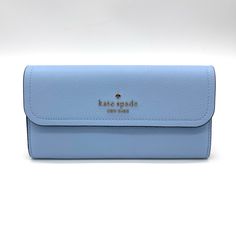 Brand New With Tag Kate Spade Rosie Large Flap Wallet Measurements 7.8" W X 4" H Color: Celeste Blue Features Metal Pinmount With Spade Logo Dust Bag Included: No Materials Pebbled Leather Lining: Two Way Spade Jacquard Lining Imported Blue Travel Clutch Wallet, Classic Blue Travel Clutch, Chic Blue Bags With Card Slots, Classic Blue Clutch For Travel, Chic Blue Rectangular Wallet, Classic Blue Bags With Card Slots, Chic Blue Wallet For Everyday Use, Chic Blue Wallets For Everyday Use, Kate Spade Blue Wallet With Card Slots