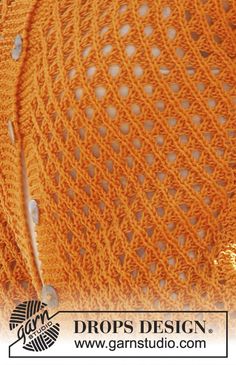 an orange knitted sweater with holes on it