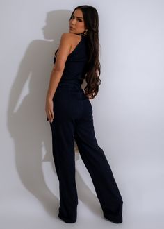 Elevate your style with the "Kiss Me Chain" Jumpsuit, a modern take on a classic denim look. This jumpsuit effortlessly blends casual cool with evening luxury, making it the perfect statement piece for any fashion-forward individual. Constructed with a mix of 76% Rayon, 22% Polyester, and 2% Spandex, this jumpsuit offers the ideal amount of stretch for a comfortable and flattering fit. The adjustable tie and back zipper add a touch of versatility and convenience, while the 34.5" inseam ensures a Casual Vacation Outfits, Dress Work Outfit, Long Crop Top, Lace Cutout, The Kiss, Casual Work Outfits, Denim Jumpsuit, Shop Maxi Dresses, Light Denim