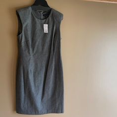 Nwt Gray Sleeveless Banana Republic Dress With Shoulder Pads And Zipper In The Back Falls At The Knees Or Just Below Size 10p Thick Fabric: 52% Cotton, 43% Rayon/Viscose, 5% Elastane Fitted Gray Sleeveless Knee-length Dress, Gray Fitted Sleeveless Midi Dress, Fitted Sleeveless Gray Midi Dress, Fitted Gray Sleeveless Midi Dress, Gray Stretch Dresses For Work, Orange Dress Summer, Dress With Shoulder Pads, Zip Front Dress, Ruffle Wrap Dress