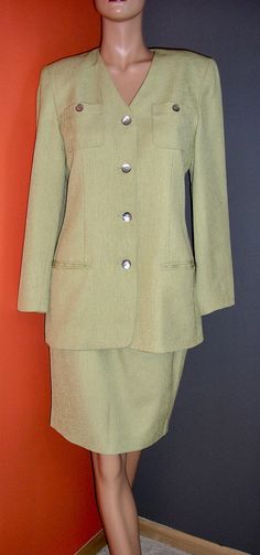 "Vintage 90s, spring, green, long jacket, strong shoulder, skirt suit. By Amanda Smith. Size 6. Shoulder pads. Fully lined. Linen look poly. Excellent condition, no flaws or damage. Appears unworn. Measurements: Jacket: shoulders across front: 15\" chest across front: 19\" waist across front: 17\" hips across front: 20\" sleeve inseam: 16\" with 1\" hem Skirt: waist across front: 13\" hips across front: 19\" length: 24\" Please remember that vintage sizes are often much smaller than contemporary Classic Fitted Green Skirt Suit, Classic Green Fitted Skirt Suit, Green Long Sleeve Formal Skirt Suit, Formal Green Long Sleeve Skirt Suit, Green Fitted Skirt Suit For Formal Occasions, Tailored Green Long Sleeve Skirt Suit, Tailored Green Skirt Suit With Long Sleeves, Classic Spring Skirt Suit With Pockets, Spring Green Fitted Skirt Suit