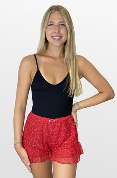 It’s hot! These lace shorties are on trend. The shorts have a small waistband with wide ruffle legs for a girly look. An adorable take on the trend. Color- Red 70% Nylon 30% Cotton Lining- 94% Polyester 6% Spandex Red Green Yellow, Black Party, Romper Pants, Short Rompers, The Trend, Red Hot, Red Purple, Sweater Skirt, Dress Collection