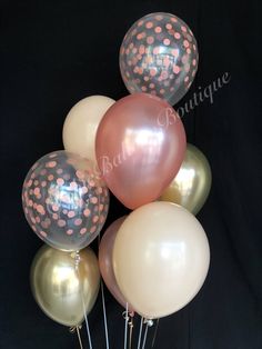 a bunch of balloons with polka dots on them