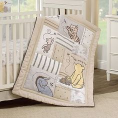 a baby crib bedding set with winnie the pooh and friends on it