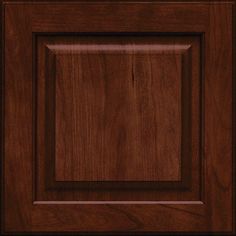 a wooden cabinet door with square and rectangles on the front panel, in dark brown