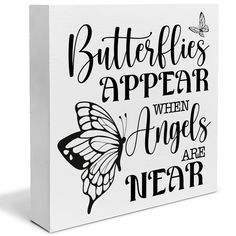 a white canvas with the words butterflies appear when angels are near, and an image of a