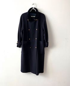 "Vintage Women's Wool blend Military Style Coat Gil Bret Retro Coat Office Women's Coat Medium size Double-breasted coat Midi navy coat with large pockets Label size: 38; F 40; I 44; GB 12 Estimated size: M Measurements: (lying flat) Length - 47\"/ 119.5 cm Pit to pit: 23\"/ 58.5 cm Waist - 23.5\"/ 59.7 cm Sleeve - 30\"/ 76 cm(from neckline) Please check measurements to insure a proper fit. Remember to allow yourself some extra room for movement. You can compare these with something from your cl Military Style Coats, Retro Coat, Navy Coat, Style Coat, Double Breasted Coat, Extra Room, Military Style, Military Fashion, Women's Coat