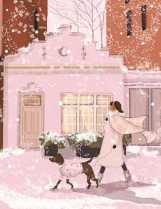 a woman walking two dogs through the snow in front of a pink building on a snowy day