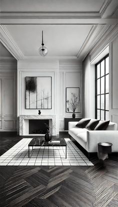 a black and white photo of a living room with couches, coffee table and fireplace