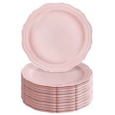 a stack of pink plates sitting on top of each other