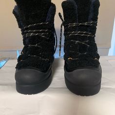 Women’s Tory Burch Courtney Shearling Boots Size 10 Super Warm Boots Laced Up The Front The Condition Of The Boots Are Shown In The Photos And They Are Still In Great Pre-Owned Condition Comes With Box Let Me Know If You Have Any Questions Willing To Negotiate Offers 2.39 (6 Cm) Rubber Wedge Heel Calfskin And Shearling Upper Wraparound Lace-Up Design Tech Wool Lining Size: Us Women’s Size 10 Black Boots With Faux Fur Trim And Round Toe, Black Leather Boots With Faux Fur Trim, Black Ankle Boots With Faux Fur Trim, Black Shearling Boots With Faux Fur Trim, Black Shearling Boots For Fall, Designer Round Toe Boots For Winter, Designer Boots With Round Toe For Winter, Designer Winter Boots With Lug Sole, Black Ankle Boots With Faux Fur Lining