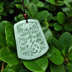 "- 100% Grade A untreated natural Jadeite Jade pendant with necklace - Detail handcrafted and fine polished - Detailed Hand Crafted with Chinese Character \"Fu\" (mean blessing, fortune and happiness) - Come with brown adjustable necklace string - Bring Protection, Safe and Calm - Dimension per piece: 48mm (H) x 38mm (W) x 6mm (T) - Weight: 28g each(approx.)" Symbolic Green Engraved Necklaces, Necklace String, 100 Grade, Art Chinois, Green Pendant, Green Pendants, Jade Carving, Silver Engraving, Jade Jewelry