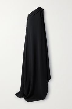 Balenciaga's gown features a dramatic cape-effect back that drapes down to the floor and leaves a short train. Made from crepe, it has an asymmetric neckline and frayed edges for a purposely undone feel. Wear yours with sock boots and one of the label's totes. Balenciaga Black Dress, Evening Gown With Cape Sleeves And Pre-draped Style, Pre-draped Cape Evening Dress, Draped Evening Gown With Sweep Train, Cape Evening Dress With Sweep Train, Evening Dress With Cape Shape And Pre-draped Style, Evening Cape Dress With Pre-draped Style, Evening Dress With Sweep Train And Cape Shape, Evening Cape Dress With Sweep Train