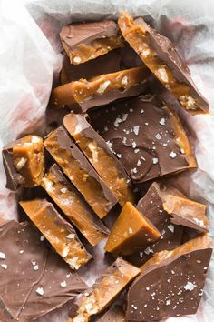 a pile of chocolate and caramel pieces