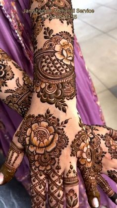 henna tattoo on the hands of a woman