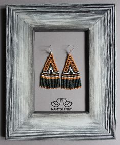 These beadwork terracotta earrings are made of high-quality Czech beads and strong synthetic thread. They are elegant, fashionable, and highly versatile, suitable for everyday wear. Features: Sterling silver components Color: orange, green, black, white Length (approximate): 6 cm (2.36 in) This item is currently in stock. You must be completely satisfied. If you find merchandise unsatisfactory for any reason, return it within 10 days and your money will be refunded without questions. These earri Black Beaded Earrings, Seed Bead Earring, Fringe Beaded Earrings, Turquoise Bead Earrings, Terracotta Earrings, Beadwork Earrings, Ombre Earrings, Bead Earring, Gray Earrings