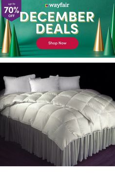 a bed with white sheets and pillows in front of a green banner that says wayfair