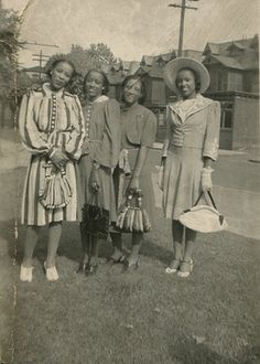 an old black and white photo of four women