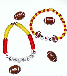 a bracelet with beads and footballs on it