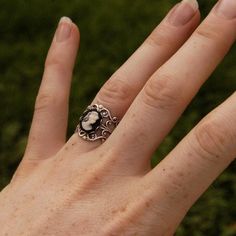 Victorian style antiqued sterling silver plate filigree ring which is fully adjustable.At its center is a 10x8mm black and white womans profile cameo. Womans Profile, Dark Academia Accessories, Victorian Accessories, White Lady, Antique Style Rings, Purple Lady, Antique Silver Rings, Cameo Jewelry, Cameo Ring