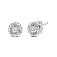 Elevate your elegance with these enchanting stud earrings, a masterpiece in 14K white gold. Immerse yourself in the brilliance of lab-grown diamonds, an ethically-conscious choice that doesn't compromise on luxury. At the heart of each earring, two mesmerizing center stone round-cut diamonds steal the spotlight, surrounded by a dazzling halo of 32 additional round-cut diamonds. Together, they create an intricate tapestry of light and sparkle that radiates sophistication. With a total diamond cou Fine Jewelry White Gold Cluster Earrings With Halo, Fine Jewelry White Gold Halo Cluster Earrings, White Gold Cluster Earrings With Halo Design, Timeless White Earrings With Halo Design, 14k White Gold Halo Diamond Earrings, 14k White Gold Diamond Earrings With Halo Design, White Gold Halo Diamond Earrings In Sterling Silver, White Gold Halo Round Cut Earrings, White Round Cut Halo Cluster Earrings