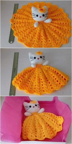 crocheted kitty doll laying on top of a pink bag next to a ruler