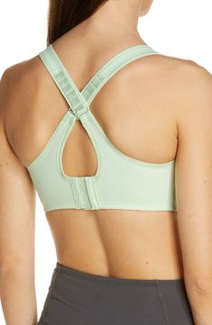 A soft and supportive sports bra is fashioned with wide shoulder straps and a powerful exterior underwire for an exceptionally secure and comfortable fit. Moisture-wicking fabric keeps skin cool and dry. Convertible straps can also be worn crossed in back. Lined. 80% nylon, 20% spandex. Hand wash, line dry. By Wacoal; imported. Lingerie. Supportive Cross Back Sports Bra With Built-in Padding, Supportive Sports Bra With Built-in Padding, Supportive Full Coverage Sports Bra With Built-in Padding, Nylon Sports Bra With Built-in Padding And Cross Back, Nylon Sports Bra With Built-in Bra For Training, Athleisure Sports Bra With Built-in Padding And Wide Straps, Nylon Activewear With Cross Back And Bra Friendly Design, Medium Support Cross Back Sports Bra With Built-in Padding, Nylon Racerback Sports Bra With Built-in Bra