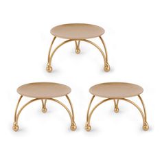 three small tables with wheels on each side and one table top that is gold colored