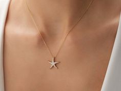 🌟 14K Gold Starfish Necklace 🌟 Embrace the beauty of the ocean with our stunning 14K Gold Starfish Necklace. This delicately crafted piece captures the essence of beachside charm, making it the perfect accessory for anyone who loves the sea. The starfish design symbolizes renewal, guidance, and strength, adding a meaningful touch to your jewelry collection. Key Features: Material: Made from high-quality 14K gold, available in yellow gold, rose gold, and white gold finishes. Chain Length: Adjus Starfish Design, Gold Necklace For Women, Gold Schmuck, Starfish Necklace, Necklace For Her, Gold Jewelry Necklace, Charm Making, 14k Gold Necklace, Gold Necklace Women