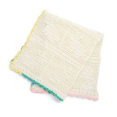 two crocheted dishcloths on top of each other, one in white and the other in yellow